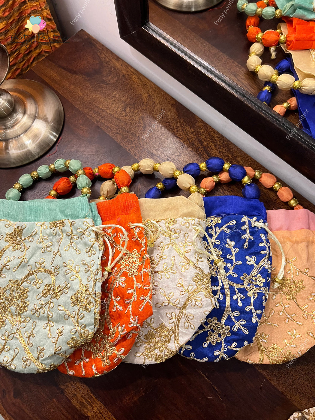 Return gift combo - Gorgeous Potli bags with Bangle Box, Bangles, Blouse bit, Kumkum and turmeric.
