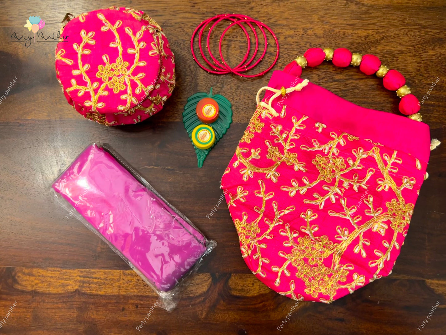 Return gift combo - Gorgeous Potli bags with Bangle Box, Bangles, Blouse bit, Kumkum and turmeric.